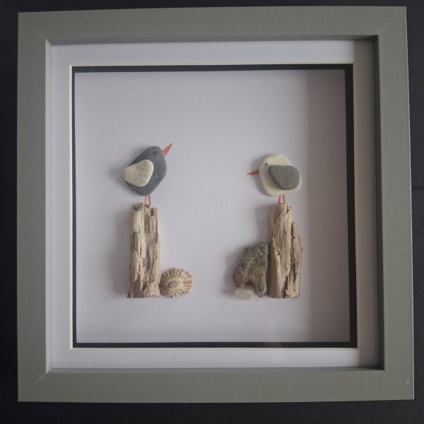 Pebble bird picture in a grey shadow box frame