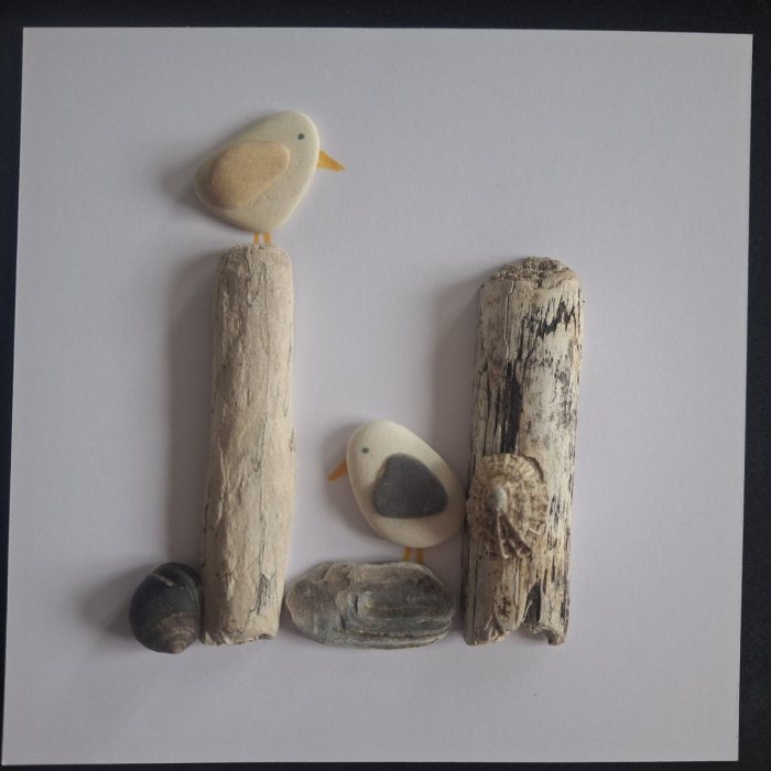 The Look-out: pebble gulls on a driftwood post and a slate pebble